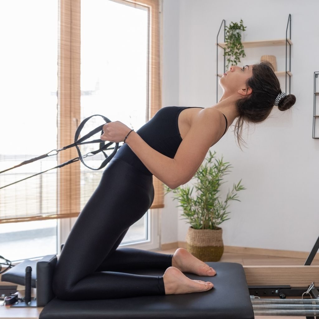 How do yoga and Pilates approaches differ to improve posture?